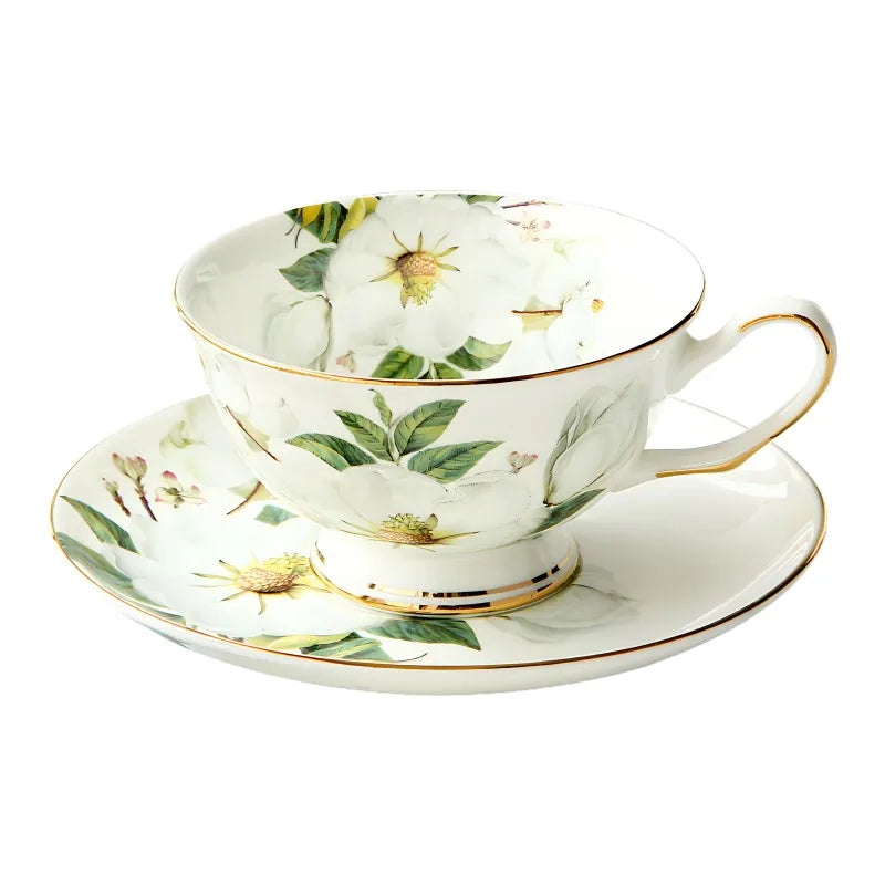 "White Camellia" fine bone china tea cup with camellia floral design and gold rim on white background — CL House & 