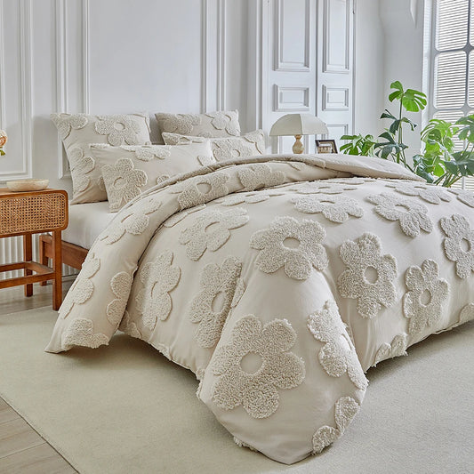 "Daisy Field" tufted cotton duvet cover set with matching pillowcases styled on a king bed in a bright Scandinavian-inspired bedroom