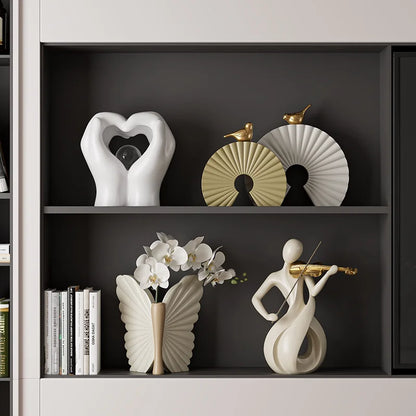 "The Violinist" abstract resin sculpture, styled on bookshelf, CL House