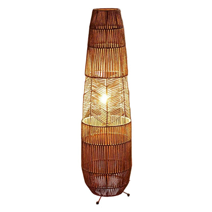 "Weave & Glow" rattan floor lamp full view showing handwoven herringbone pattern and sculptural silhouette on white background