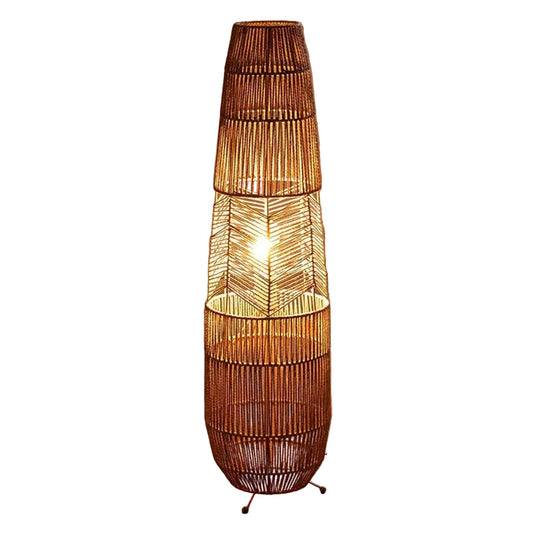 "Weave & Glow" rattan floor lamp full view showing handwoven herringbone pattern and sculptural silhouette on white background