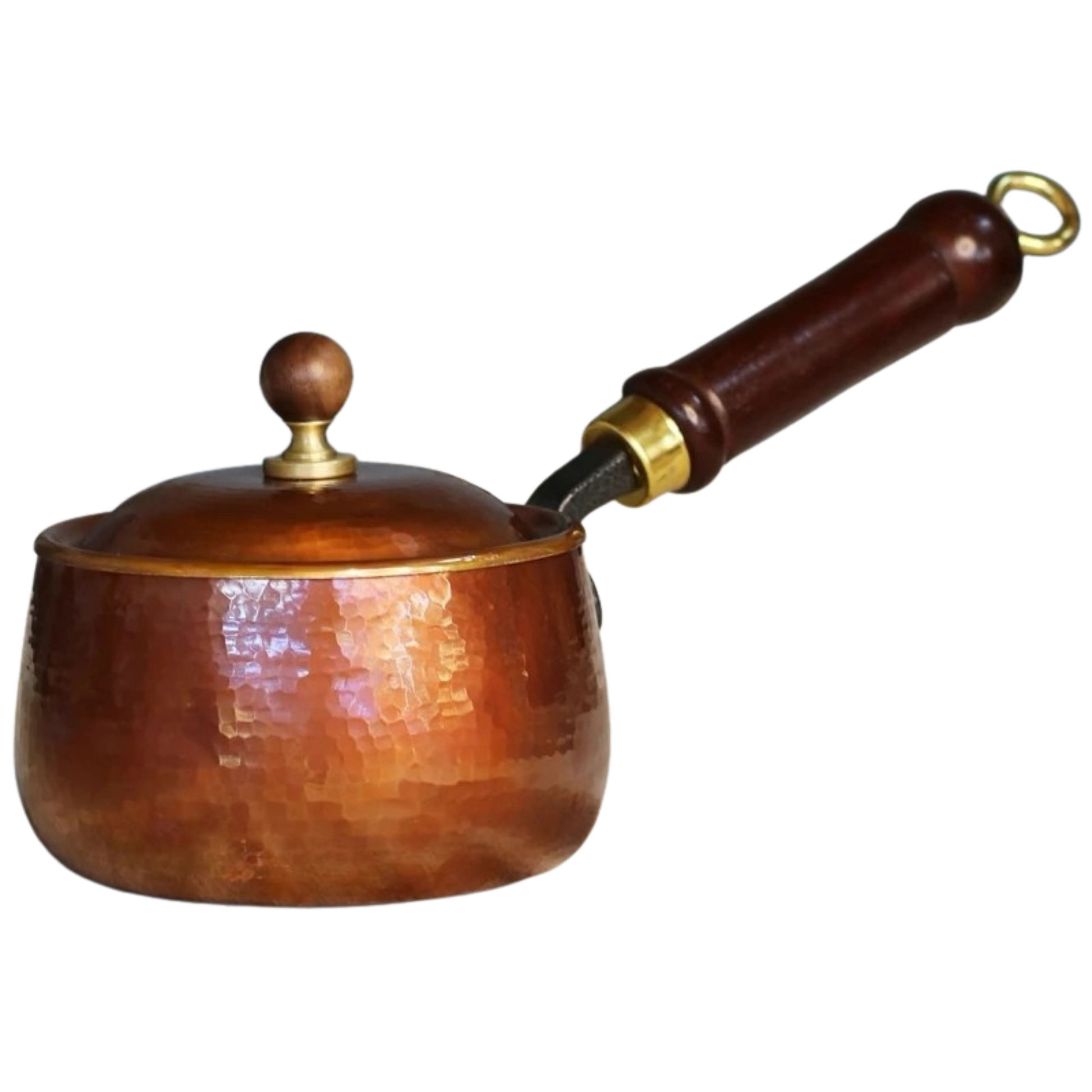 Hand-hammered pure copper saucepan with domed copper lid, dark wooden handle with brass fitting and hanging ring on white background — side view showing hammered texture and warm copper patina — Copper Forge Saucepan by CL House