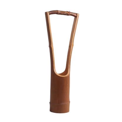 Handmade natural bamboo vase with tall arched bamboo handle forming a triangular shape, open body design, grey background

Manda a última! 📸