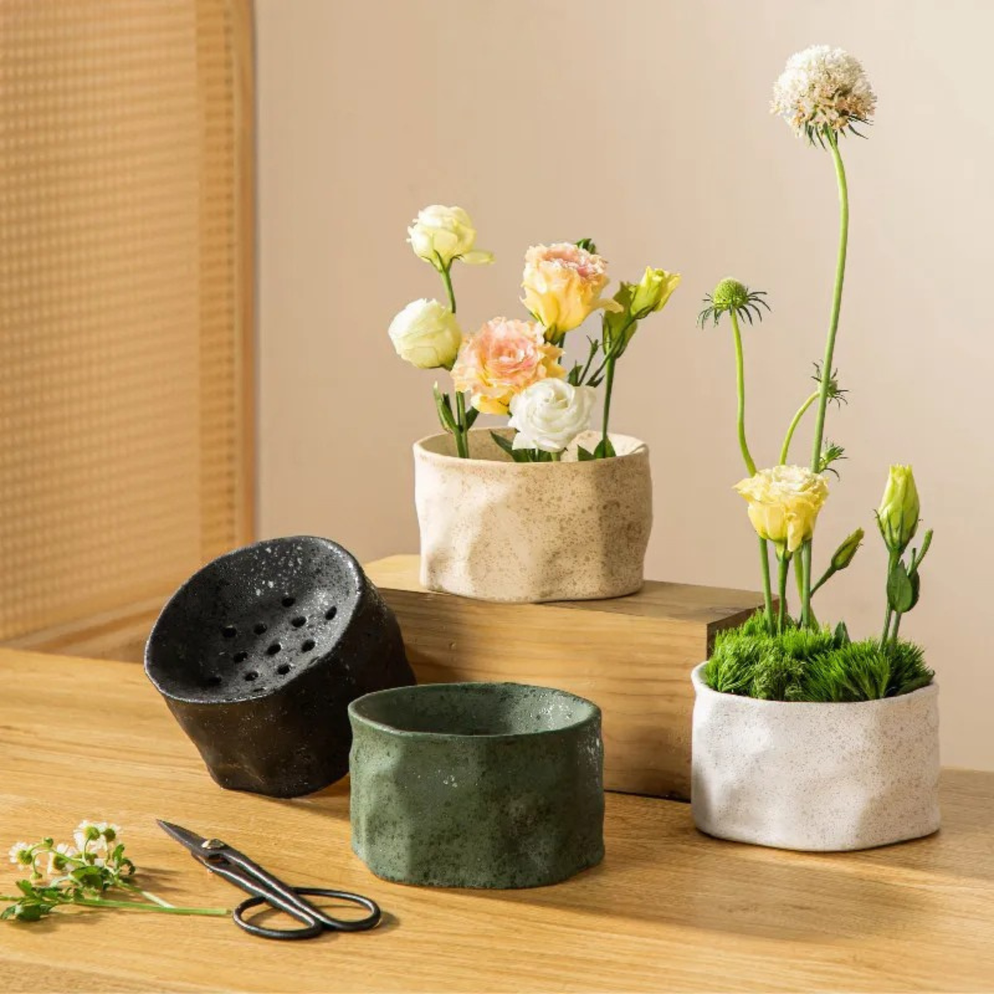 "Kenzan Bowl wabi-sabi ceramic ikebana holders in Sand, Stone, Moss and Obsidian glazes on wooden surface"
