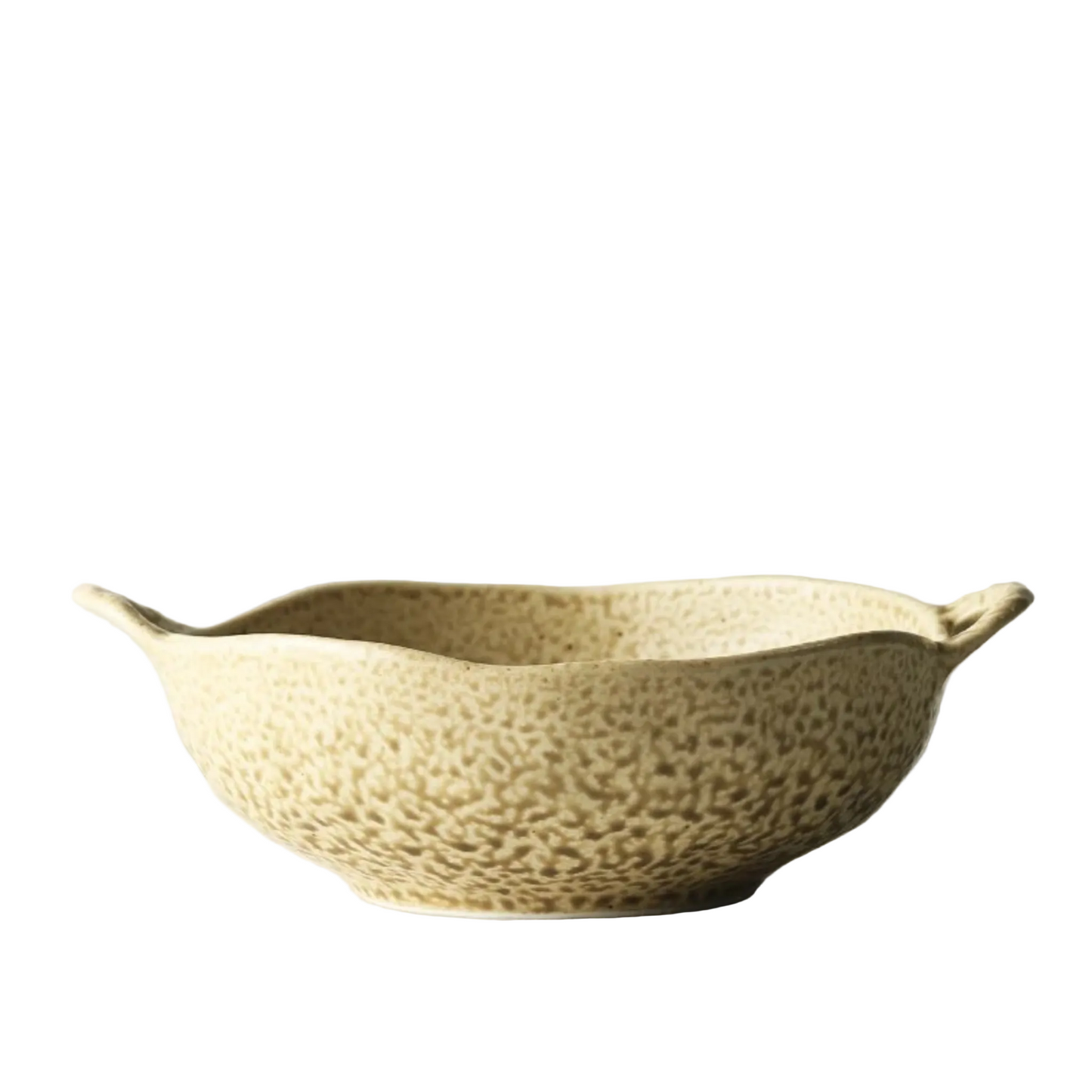  "Wabi Crest" stoneware serving bowl in natural stone cream with speckled reactive glaze and organic rippled rim — side view on white background