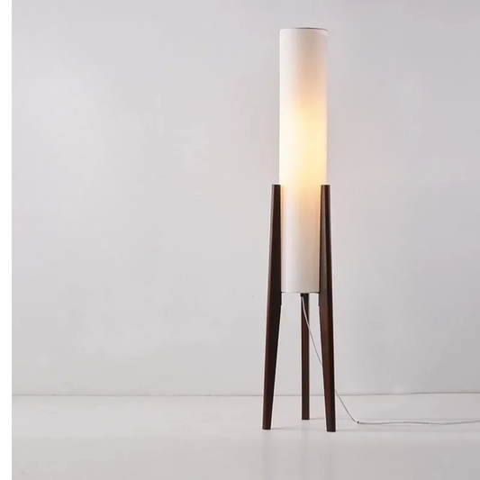  "Tripod & Cylinder" oak floor lamp with white cylindrical fabric shade and solid wood tripod base on a neutral background